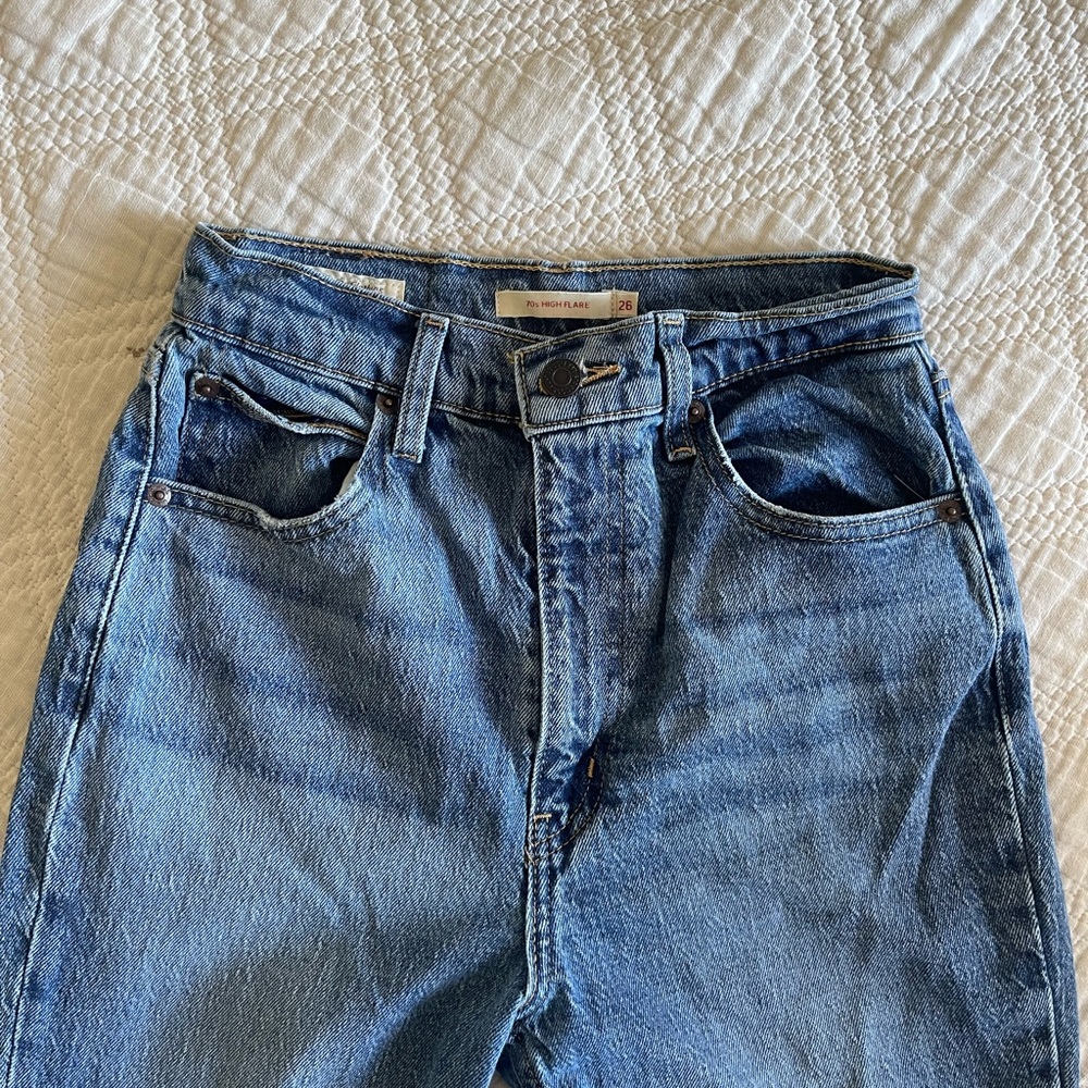 Levi’s Blue Flared Jeans with High-Waisted Design